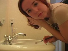 Kilo Sex presents: Redhead in tee shirt does her makeup