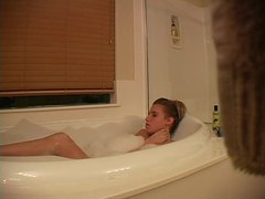 Kilo Sex presents: Hidden camera captures girl masturbating in bathtub