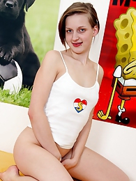 KiloSex presents: A handsome teenage babe pleasures her moist and bald cunt