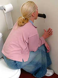 KiloSex presents: Blonde girl Jamie sits on the toilet and blows a black gloryhole dong