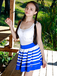 KiloSex presents: Fresh-Faced russian beauty Mia Grandy gets totally naked on a picnic table in a garden